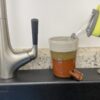 Bronze scrubby holder self draining and drying for kitchen sinks