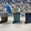 Three different self-draining scrubby holder products teal, navy, and bronze