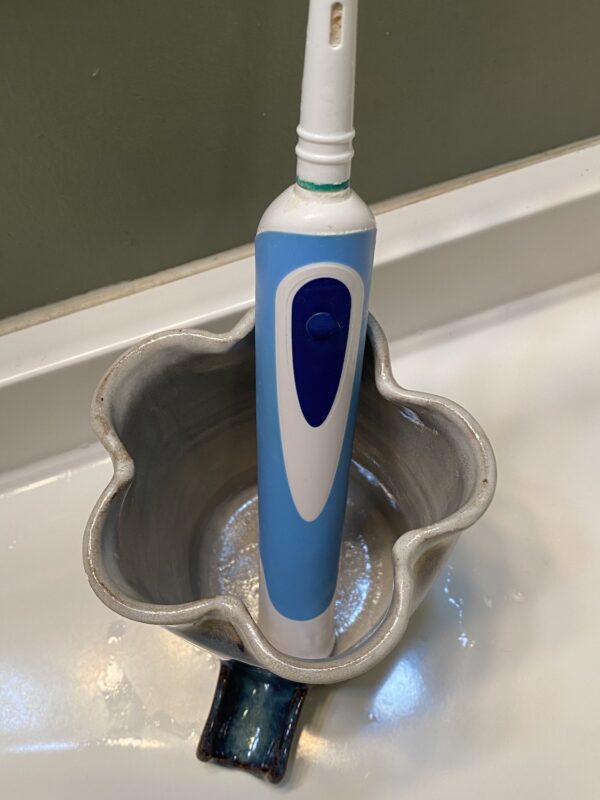 Navy outside white inside toothbrush holder fits electric toothbrush
